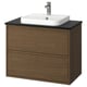Modern wooden bathroom vanity in brown oak with black countertop and square white basin. Wall-mounted with minimalist design.