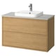 Modern light-wood bathroom vanity with white basin, minimal handles, two drawers, and wall-mount design.