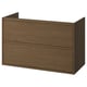 Depicts an ÄNGSJÖN brown oak bathroom cabinet with integrated handles, minimalist design, and drawer storage.