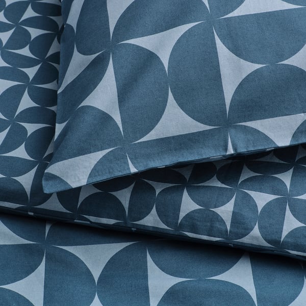 Geometric-patterned, blue duvet set with crisp, soft fabric. Dark and light shades create a modern look.