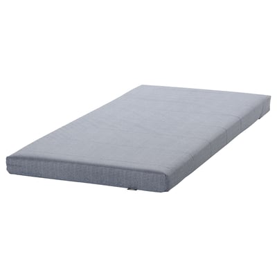 A rolled-up grey ÅGOTNES foam mattress, featuring a smooth cover and firm comfort layer.