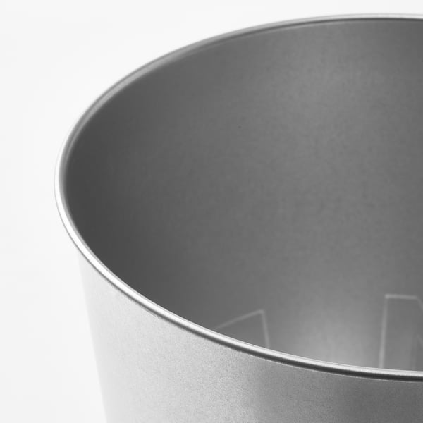 Black steel plant pots, smooth, stacked, country style.