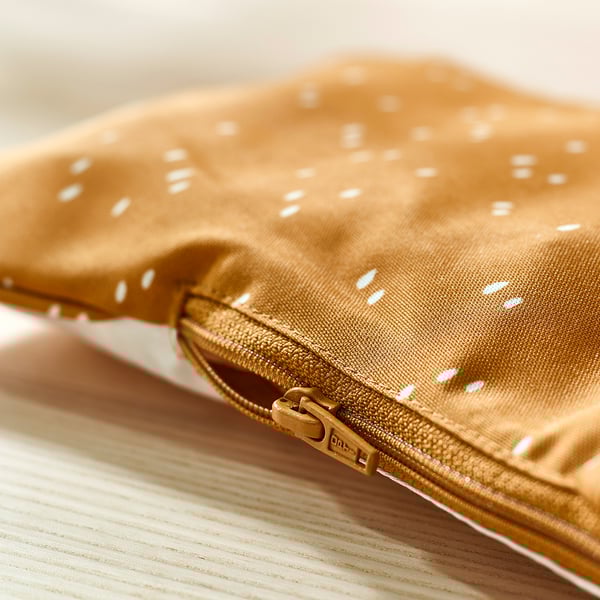 Zippered, washable anti-slip cover for easy cleaning.