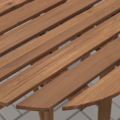 Close-up of an ASKHOLMEN table, showcasing its smooth, well-stained, interlocking wooden slats.
