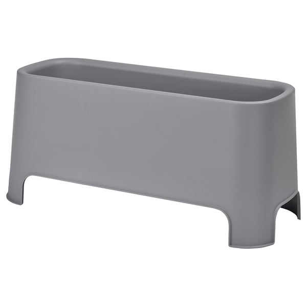 Grey rectangular planter with smooth surfaces and slightly curved edges, made of recycled plastic. Ideal for indoor and outdoor use.