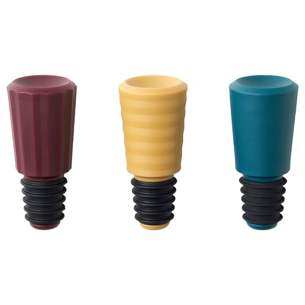 Three colourful silicone and plastic bottle stoppers; red, yellow, blue, ribbed design.