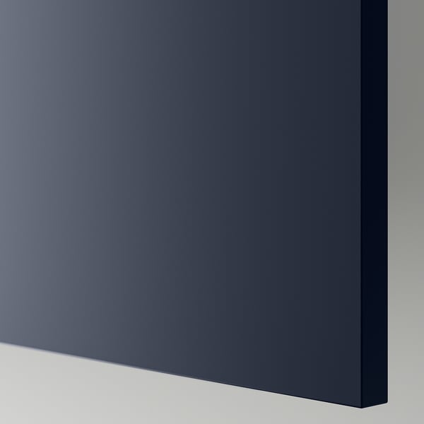 Dark grey flat-panel surface, smooth texture, high-quality finish.