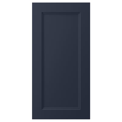 A dark blue, rectangular AXSTAD cabinet door with a smooth, inset panel design, made from fibreboard and plastic foil.