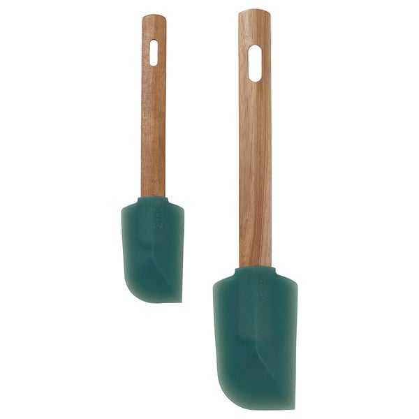 Two green spatulas with wooden handles for family baking, designed for adults and kids.