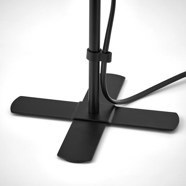 Black lamp base with four extended arms, stable design, metal material.