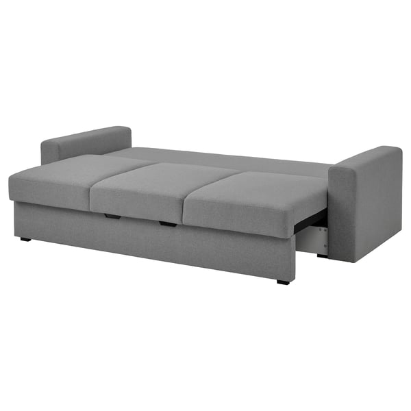 Grey sofa-bed with plush cushions and under-seat storage.