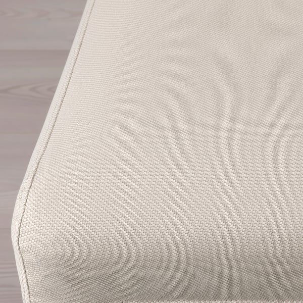 Sleek beige fabric chair, professionally stitched edges, part of the BERGMUND series, exuding comfort and quality.