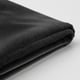 Folded black velvet chair cover, smooth texture, luxurious look.