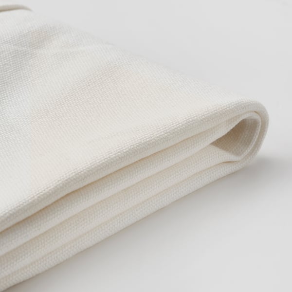 Folded white cotton cloth, smooth and crisp, laid flat.