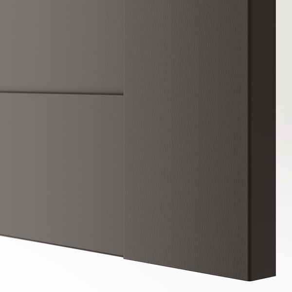 Dark grey, modern, smooth cabinet door with clean lines and faint wood grain pattern; classic design.