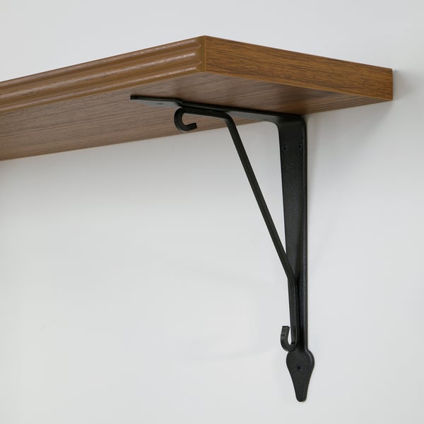 Wooden shelf with metal bracket, securely attached to wall, lightweight yet sturdy, minimalist design.