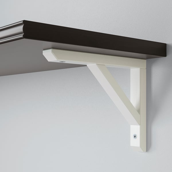 A sleek, wall-mounted shelf with a sturdy support bracket, featuring smooth and bevelled edges, securely attached to a wall.