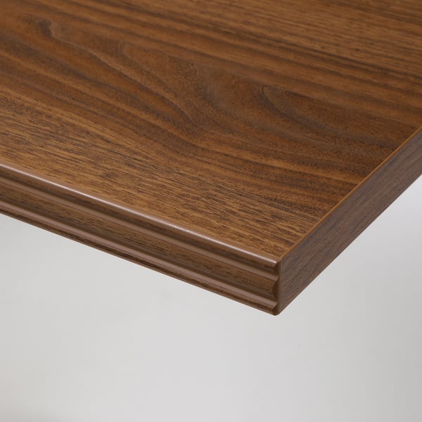 Close-up of walnut-patterned shelf edge, smooth finish.