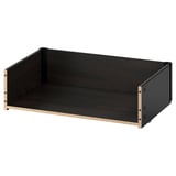 A black BESTÅ drawer frame, rectangular shaped with wooden sides, suitable for organising items.