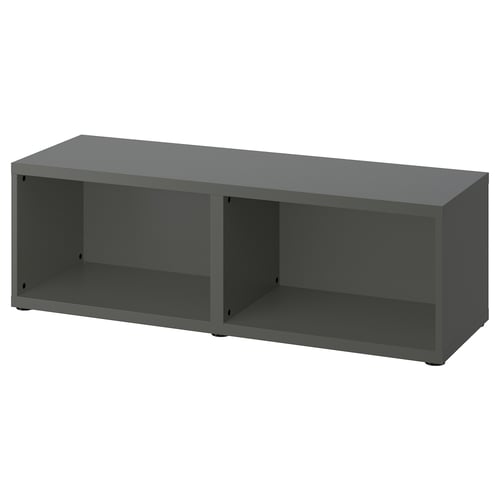An IKEA BESTÅ grey storage unit, rectangular with open compartments, made of cardboard and plastic.