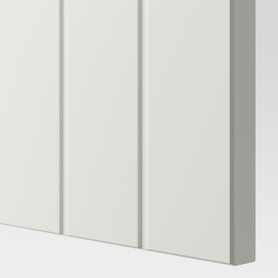 Close-up of white BESTÅ cabinet, smooth surface, clean edges.