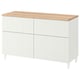 A white BESTÅ sideboard with wooden top, featuring four compartments for storage.