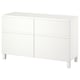 White BESTÅ storage unit, four-door cabinet with sleek modern design, white legs.