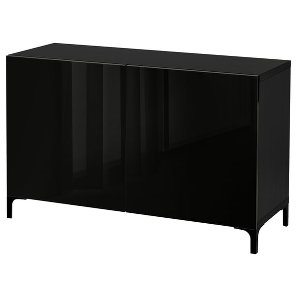 Black BESTÅ cabinet with mesh doors and metal legs.