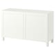 White BESTÅ sideboard with clean lines, featuring adjustable shelves, and soft-closing doors.