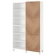 A white BESTÅ storage unit with light wood herringbone doors. It open and closed storage, standing on four legs.
