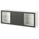 Modern white and black BESTÅ sideboard with glass doors and shelves.