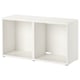 White BESTÅ storage unit, modern minimalist design with open compartments, adjustable feet.