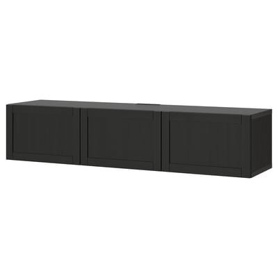 Modern black tv stand with minimalist design & adjustable shelves.