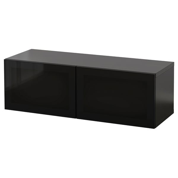 A black rectangular BESTÅ cabinet with two glass doors. It has a sleek modern design, made from particleboard and aluminum, with a glossy finish.