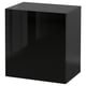 Black cube-shaped storage unit, sleek high-gloss finish, modern minimalist design.