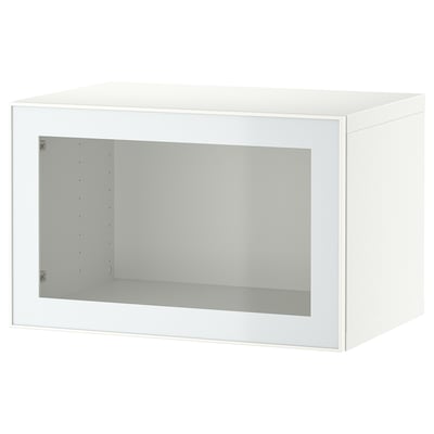 An ikea BESTÅ storage unit, white, box-shaped with a glass door, modern design.