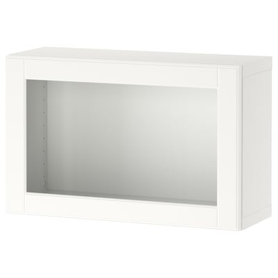 White BESTÅ cabinet, minimalist design. Rectangle shape, open front, fits wall storage.