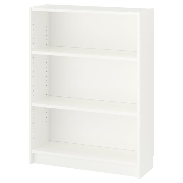 A white BILLY bookcase with three adjustable shelves. Its rectangular and made of particleboard and melamine foil.