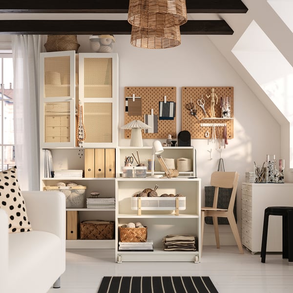 BILLY bookcase combo, white, mixed storage, foldable tables, wooden accents, books, crafts. Larger than chair & stool, maximising space.