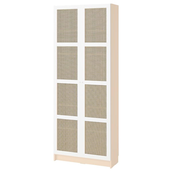 A BILLY bookcase with beige, bamboo-patterned doors, standing tall and closed.