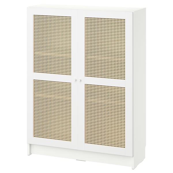 A white BILLY bookcase with bamboo woven doors. Its rectangular and has a modern, airy design.