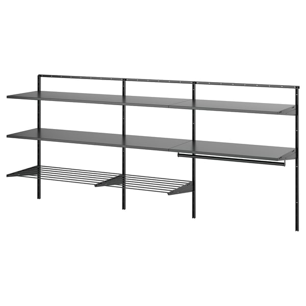 A BOAXEL black wall-mounted storage system with metal shelves and a drying rack, designed for organizing laundry.