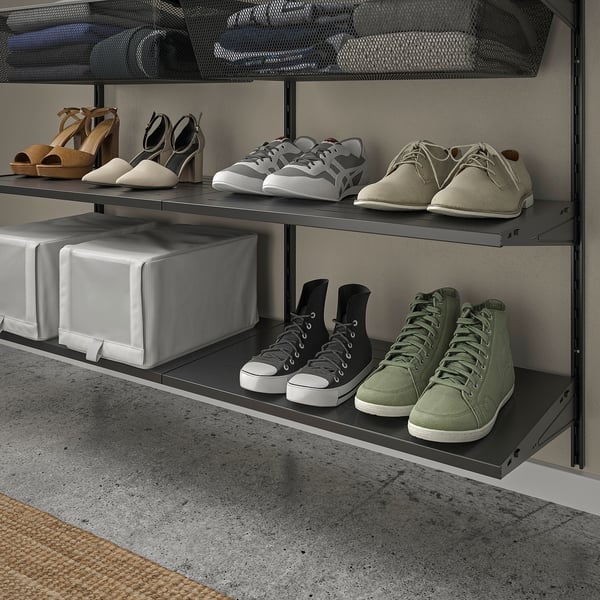 Shoe storage shelves, organising footwear neatly.
