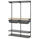 An IKEA BOAXEL dark grey wall-mounted storage system with shelves, hanging rail, and mesh baskets.