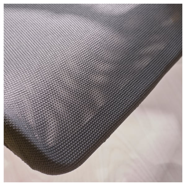 Close-up of a grey mesh fabric, showcasing its texture and quality, part of a gaming chair.