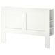 The BRIMNES headboard in white built-in storage and adjustable shelves, perfect for small spaces.
