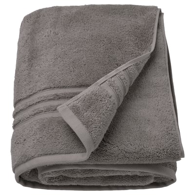 Grey BROKGLIM organic cotton towel, folded, soft with woven border.