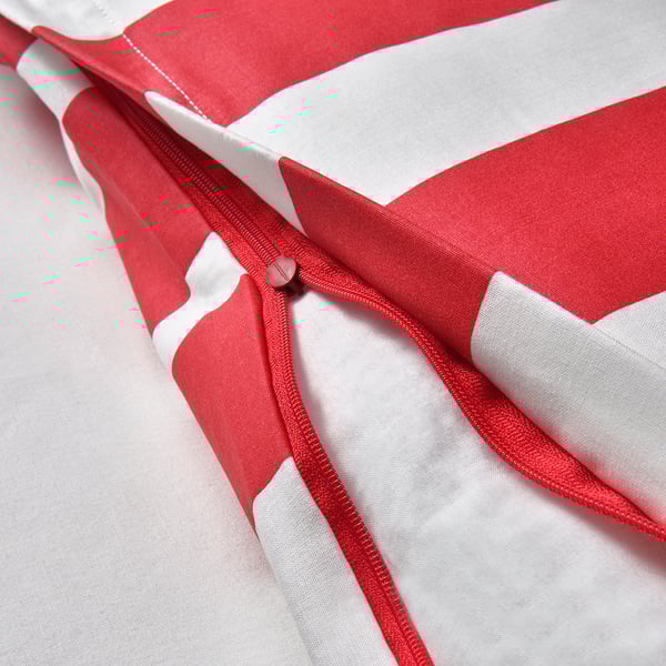 Red and white striped duvet cover with open zip showing soft, natural fabric blend.