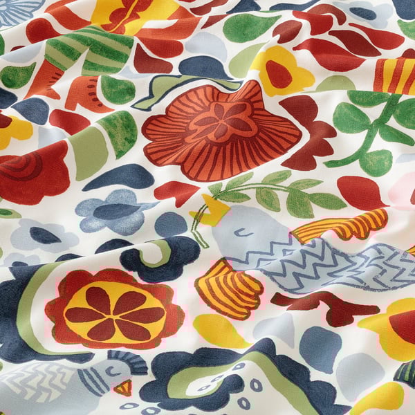 Bright, abstract fabric with bold floral, bird, & human patterns. Vivid colours on recycled cotton.