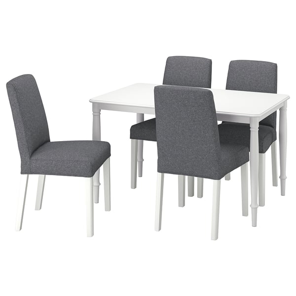 Modern white dining set with four matching grey chairs, sleek design, durable materials.